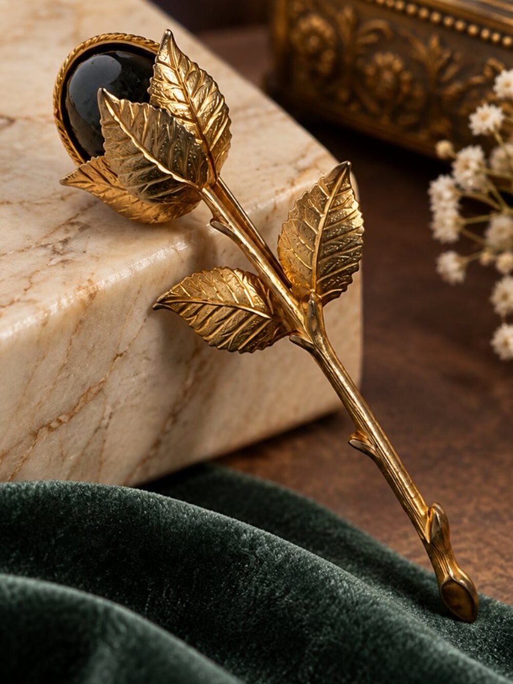 Vintage Gold Tone Long Stem Rose Brooch with Dark Gemstone Accent